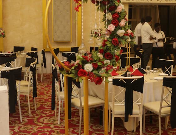 Floral table staging inside a banquet hall